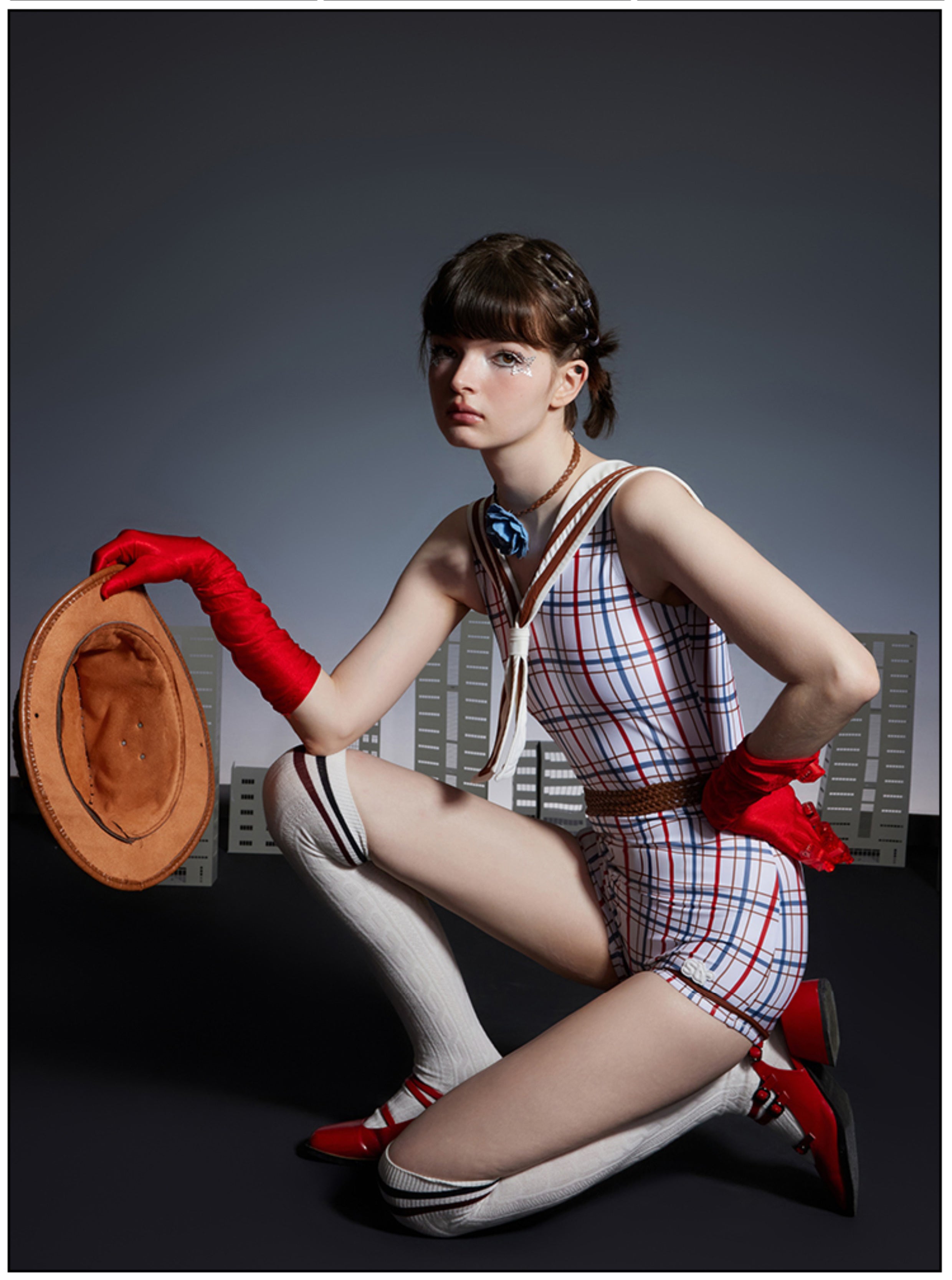 One-piece swimsuit with navy collar red, blue and white stripes