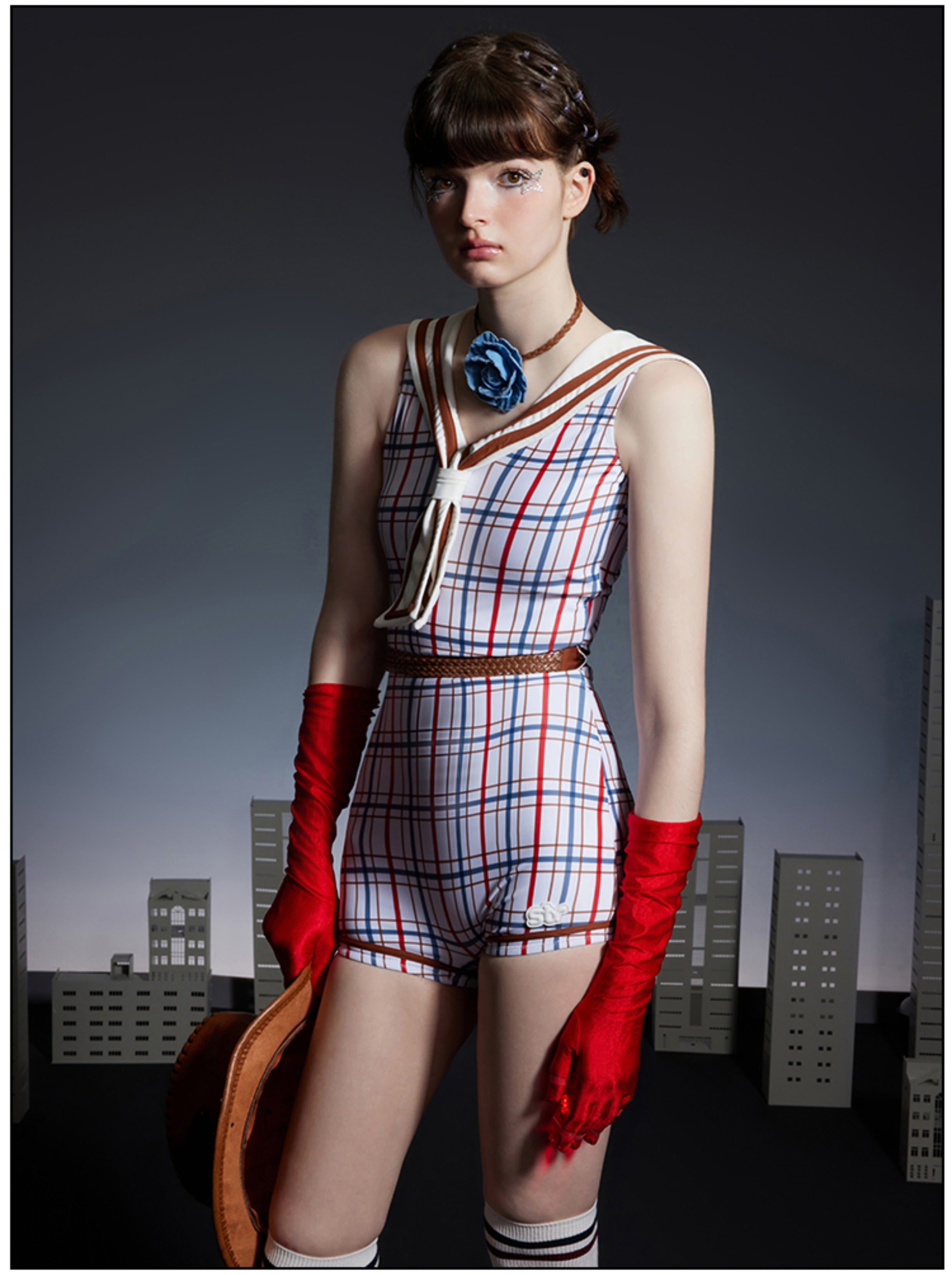 One-piece swimsuit with navy collar red, blue and white stripes